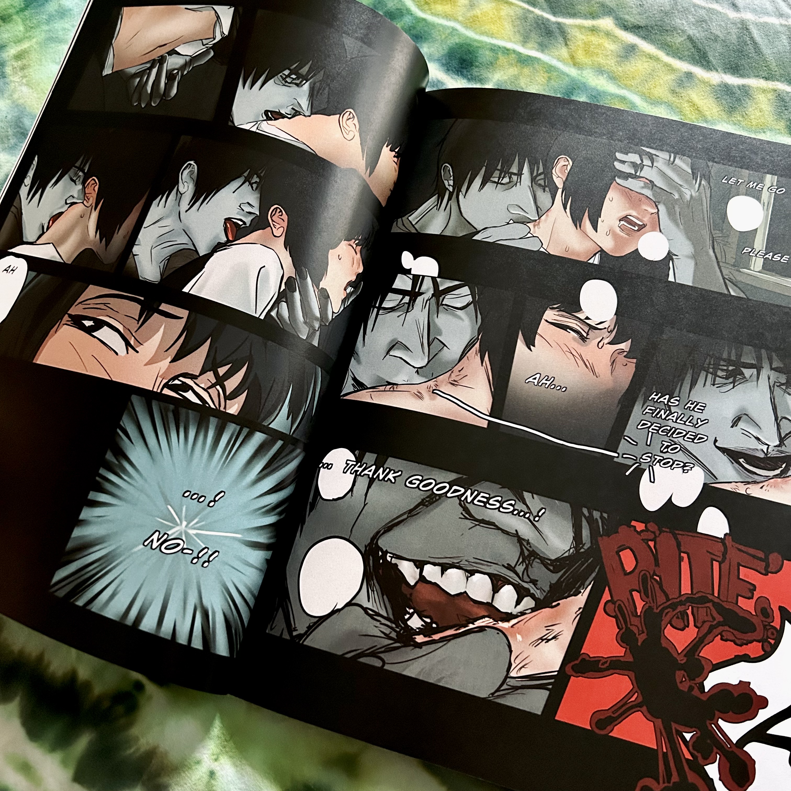 a photo of Little Death Volume 1 where Callisto is kissing Ellery’s clavicle and biting him. Ellery is both scared and aroused.
